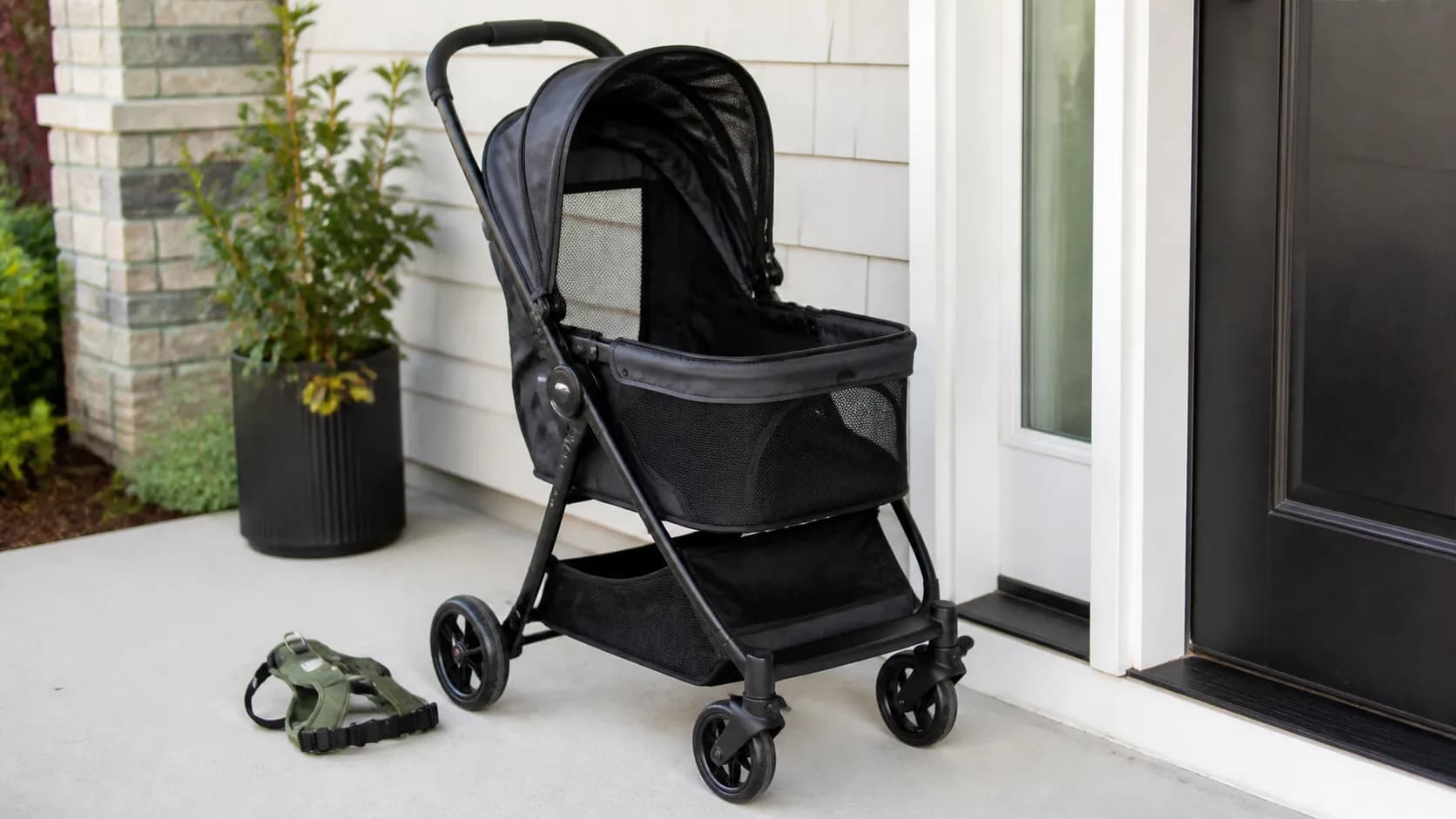 Editorial pet travel scene representing a compact pet stroller